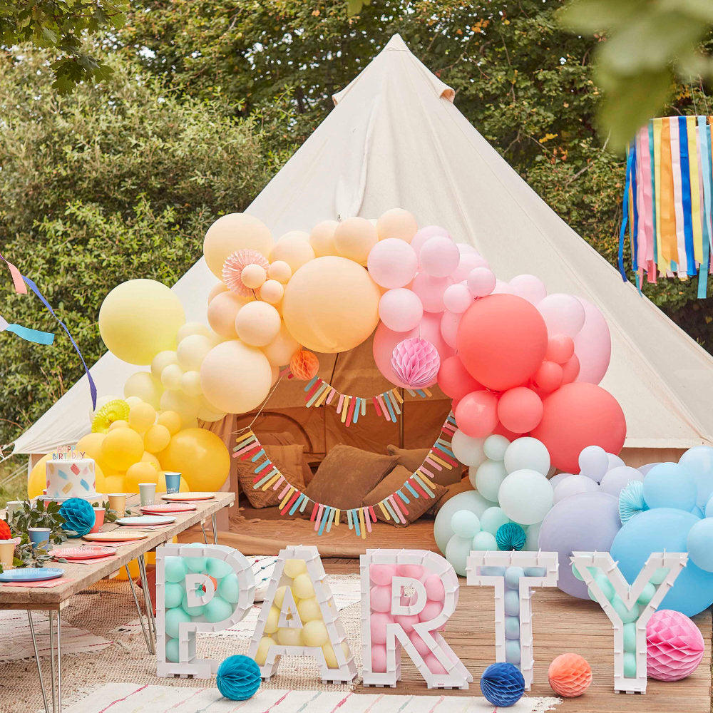 Outdoor party tent with balloons